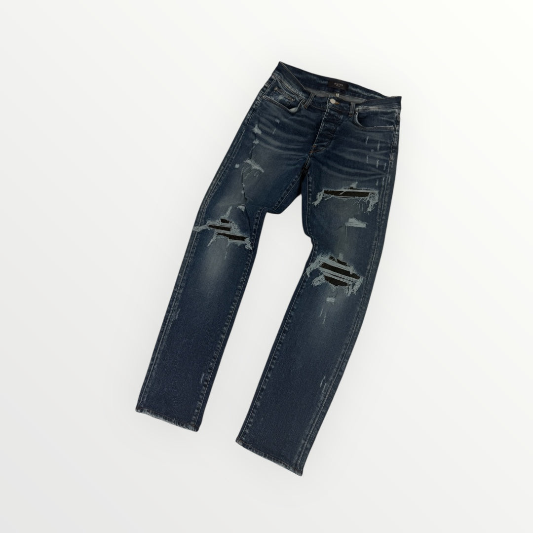 Amiri Ripped Blue Jeans