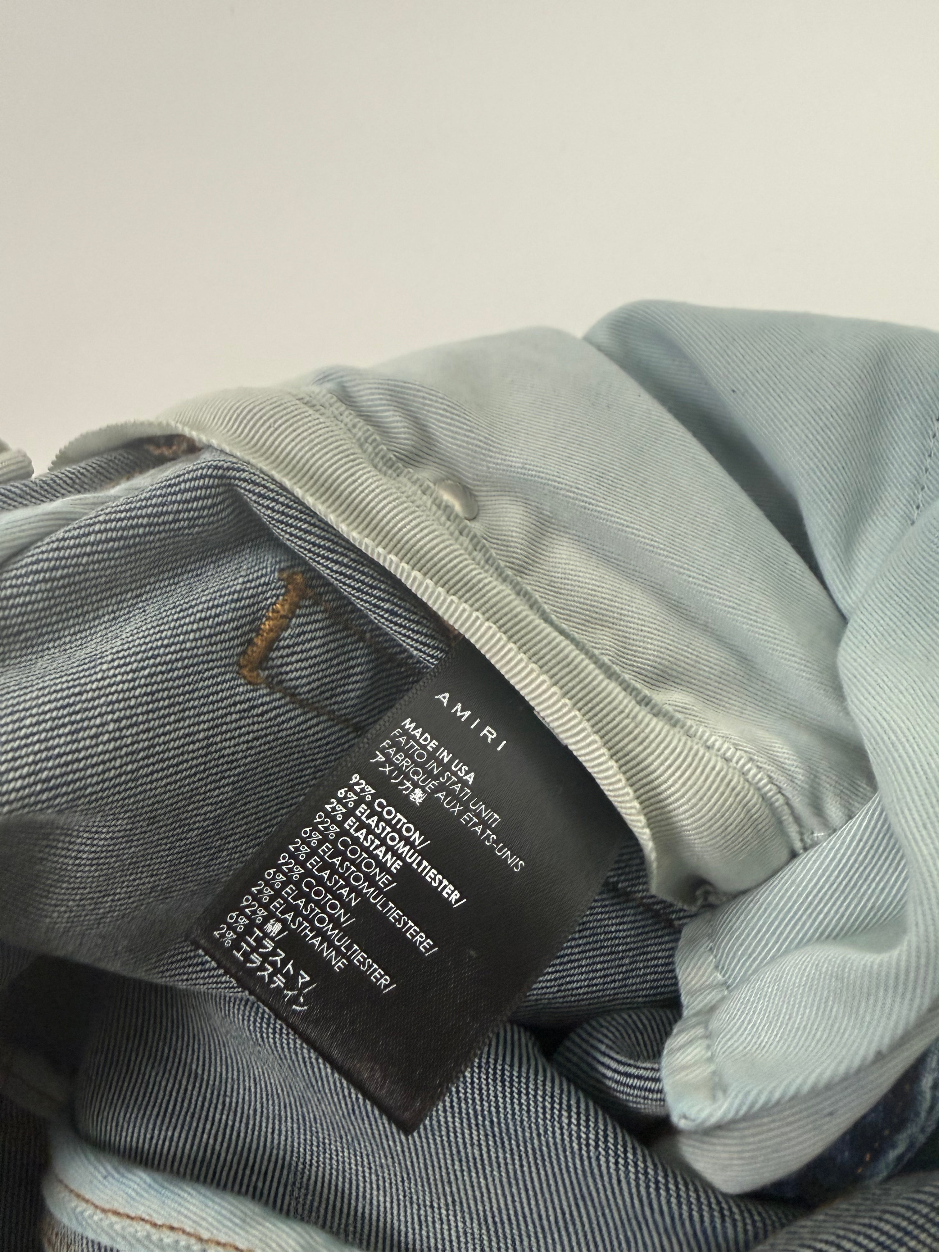 Amiri Ripped Blue Jeans