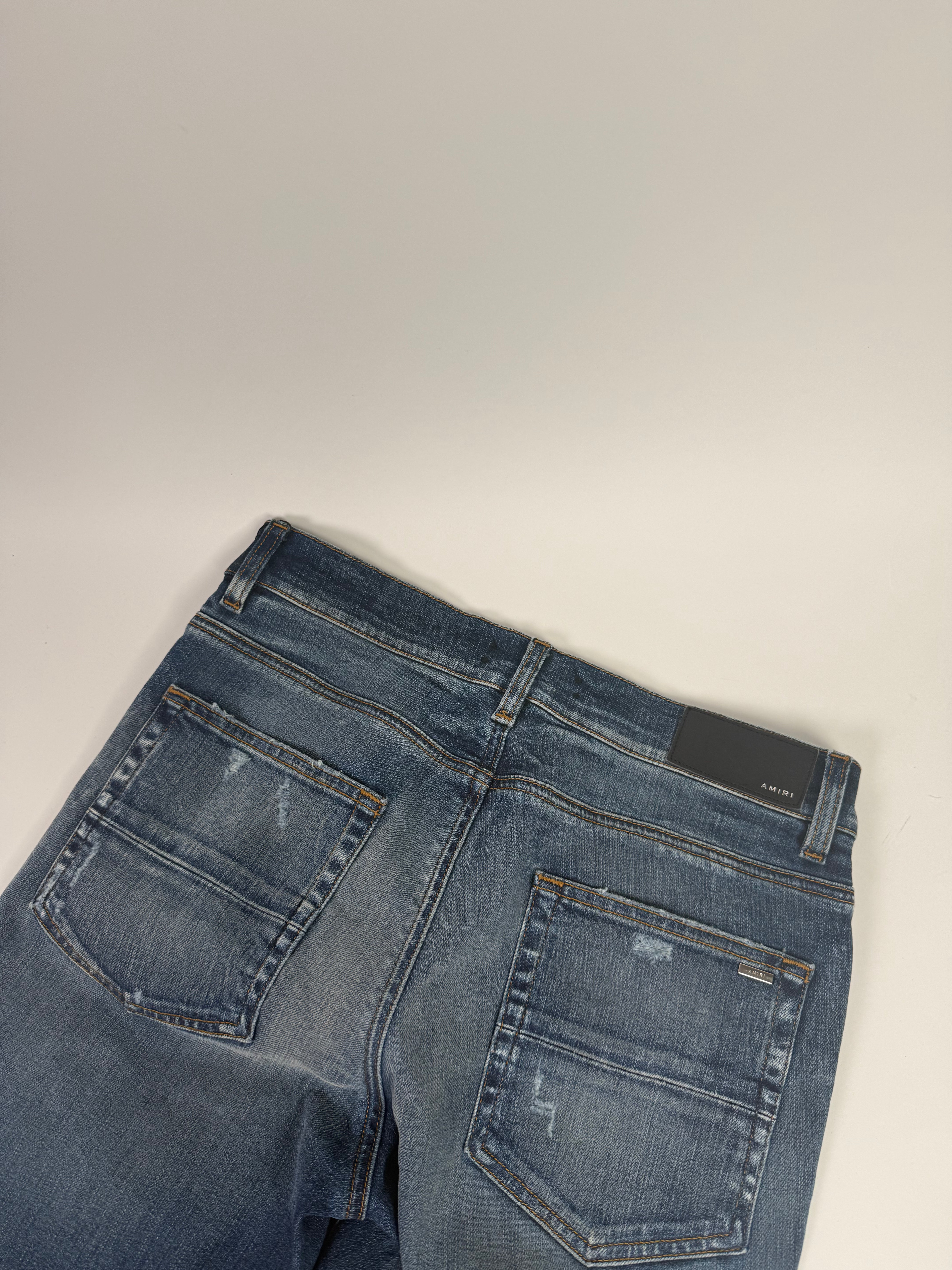 Amiri Ripped Blue Jeans