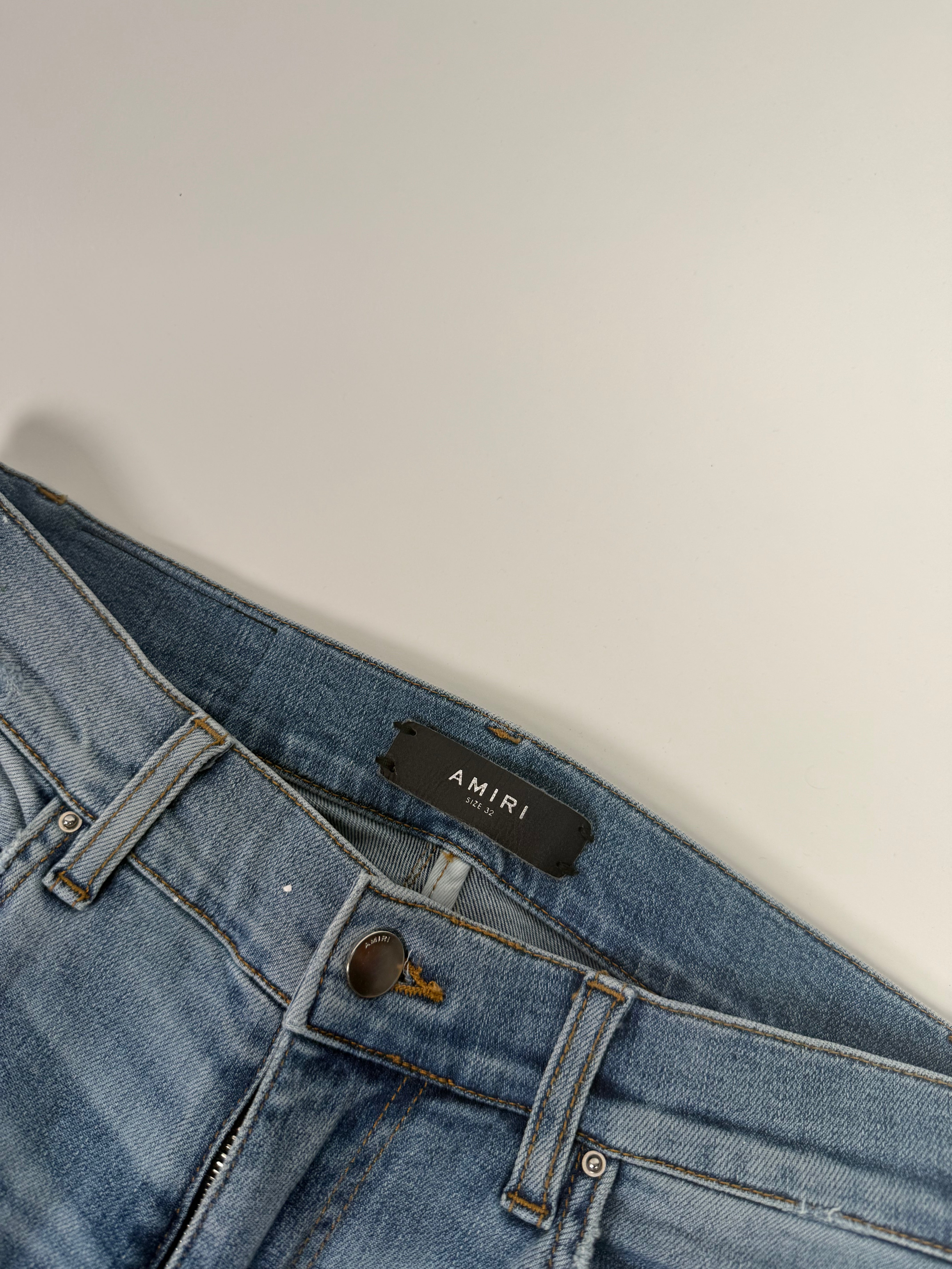 Amiri Ripped Blue Jeans