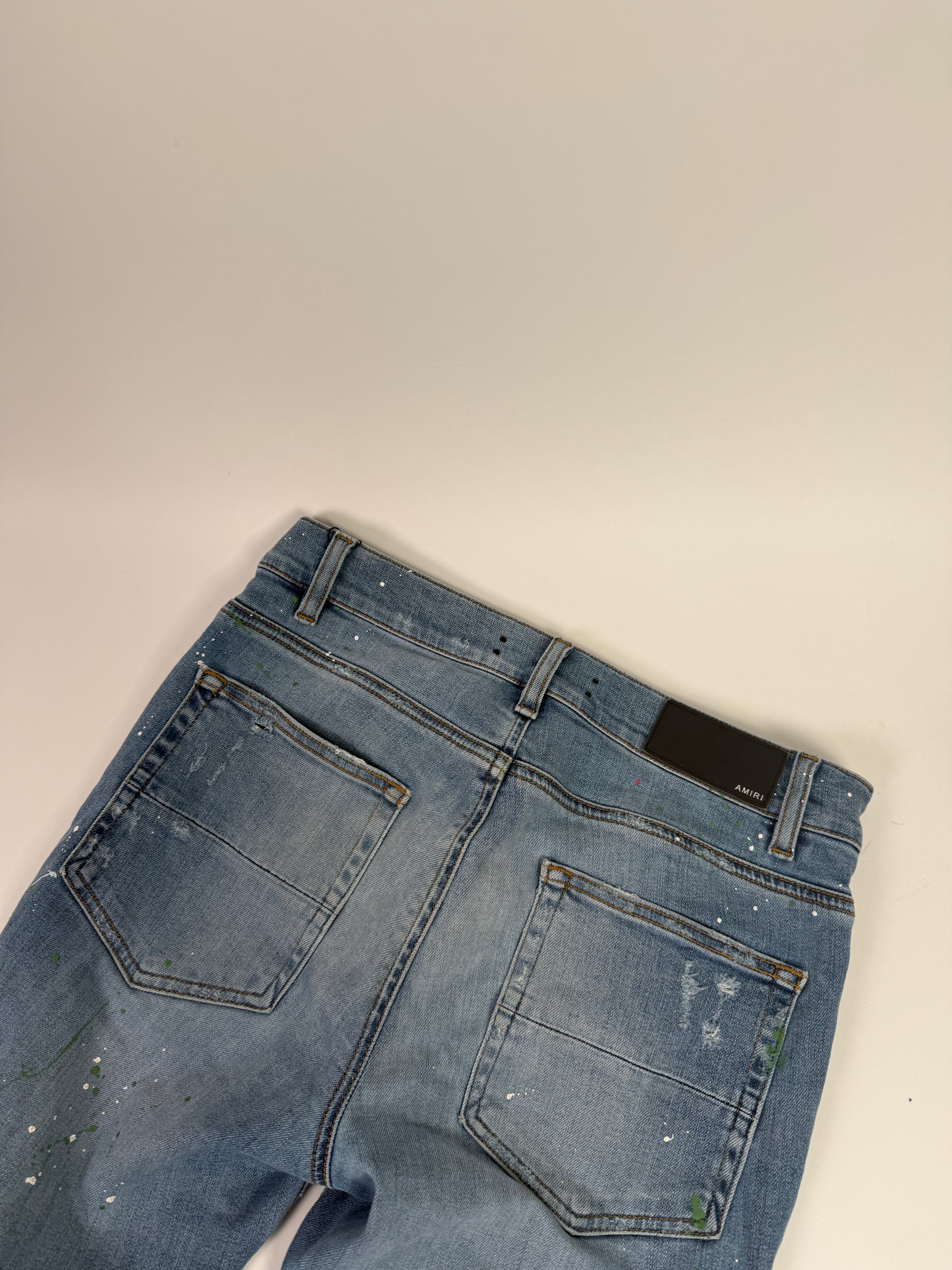 Amiri Ripped Blue Jeans