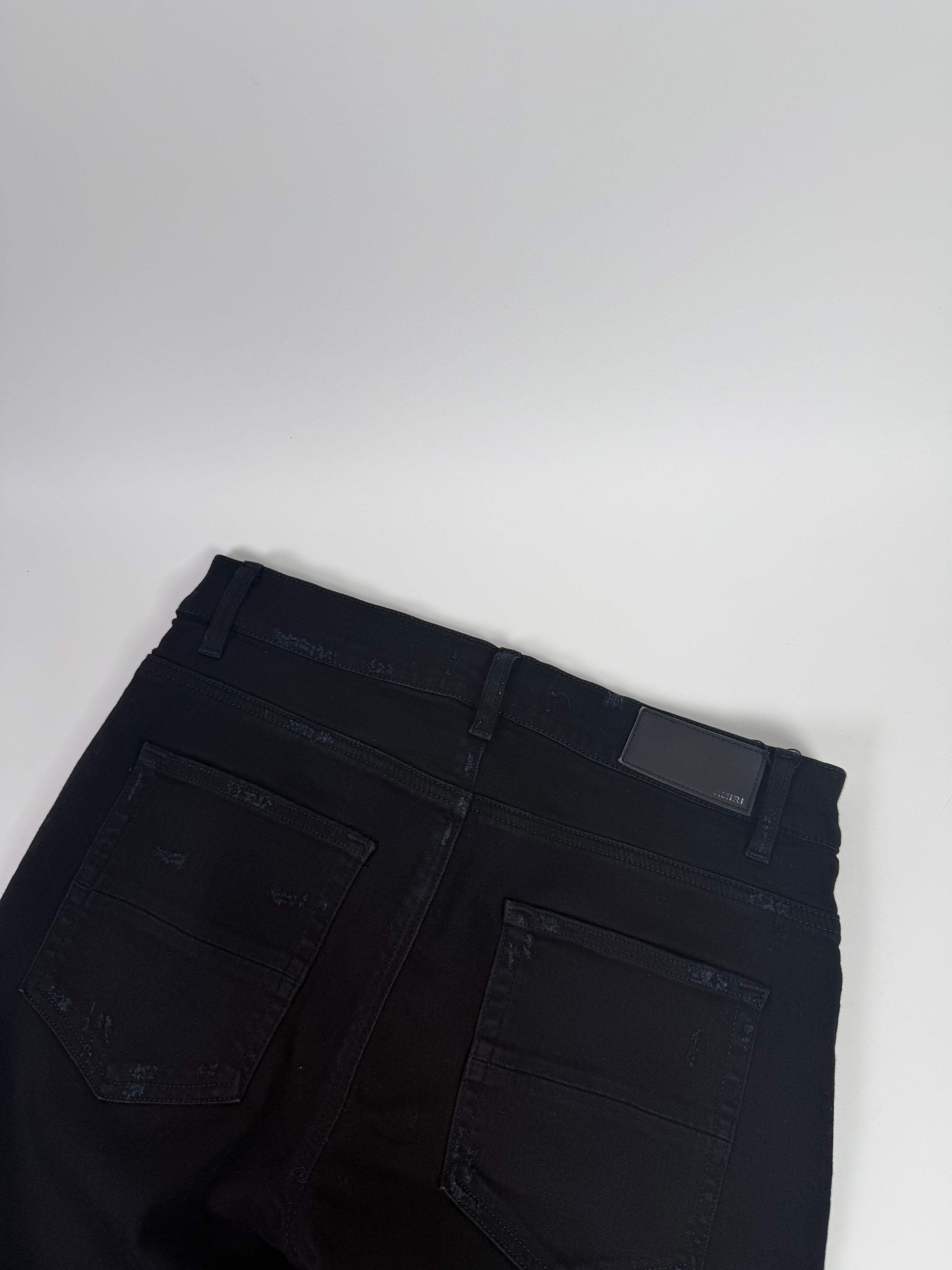 Amiri Ripped Black Jeans Zebra Pattern