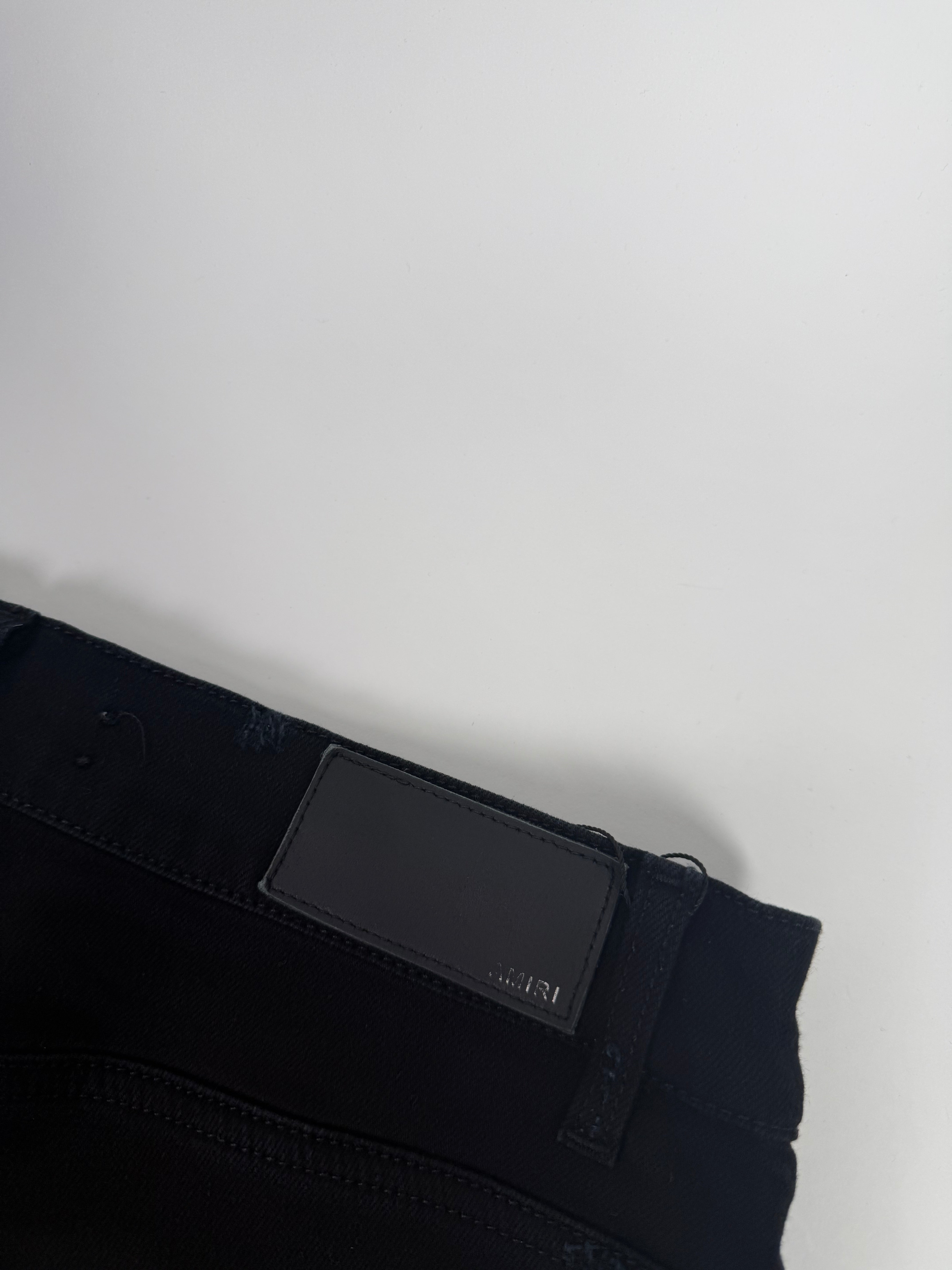 Amiri Ripped Black Jeans Zebra Pattern